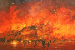 空襲で炎上する水戸駅前の画像